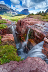Sunset at Triple Falls in Glacier National Park, Montana, USA