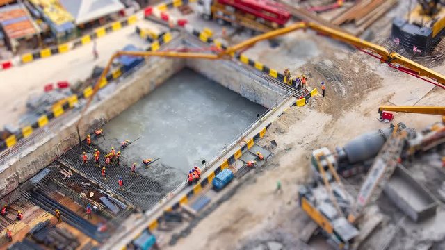 Aerial Big Construction Site Working 4K Time Lapse Tilt-Shift (zoom in)
