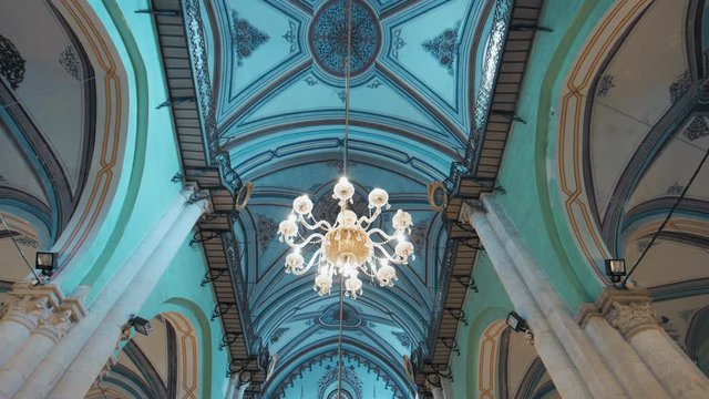 Hebron, Al Khalil, Palestine, West Bank. Wide shot, fixed shot inside the Ibrahimi Mosque, Al Haram Al Ibrahimi, The Cave of the Patriarchs, looking at ceiling light and decoration. 4K footage
