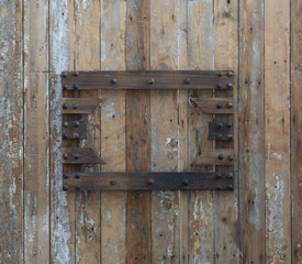 Vintage rustic frame on an old weathered dirty wooden wall