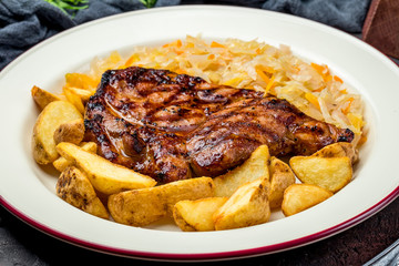 Fried pork loin with cabbage and potatoes