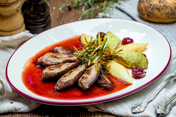 Duck breast with berry sauce