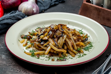 Fried potatoes with mushrooms