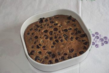 Clafoutis with Cherry. Red and ripe cherries. Preparation and close-up.
