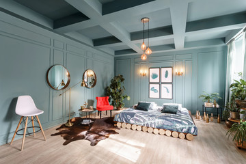 Morning interior in bedroom hotel. Bright and clean interior design of a modern room with bed,...
