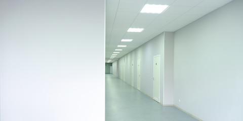 Medical clinic. A long corridor with offices for doctors.