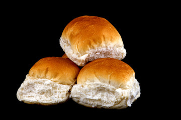 Fresh Bread Rolls on a Black Background
