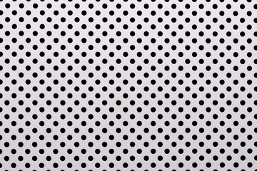 gray abstract background on based of metal, circles and shadows, texture of the white surface with a lot of round holes