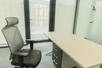 Wooden table with chair in office