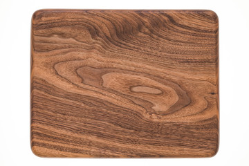 Handmade walnut rectangular mahogany chopping board, walnut texture background	