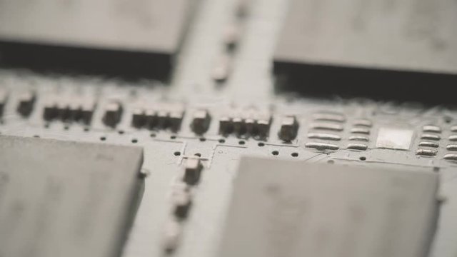 Shalow focus macro shot of soldered computer circuit board components