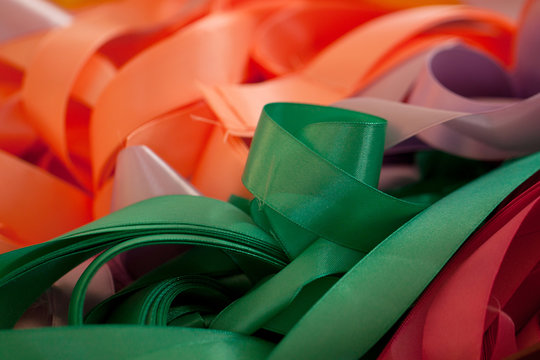 folded colorful bright silk ribbons prepared for decoration of a holiday or festival