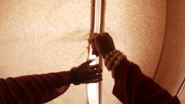 POV, opening tent in desert