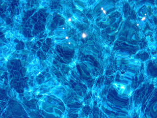 Fototapeta na wymiar Beautiful pure blue water and a swimming pool.