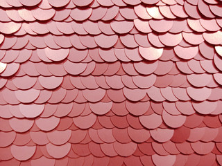 Large shiny semi-matt pink sequins fully filling the background space.