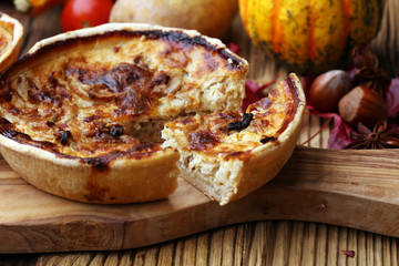 Homemade Cheesy Egg Quiche for Brunch with Spinach and Tomato, onions and zucchini.