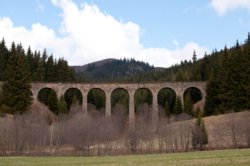 Fototapeta na wymiar Old stone viaduct