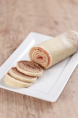 Bolo de rolo (swiss roll, roll cake) typical Brazilian dessert.