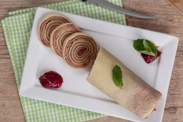 Bolo de rolo (swiss roll, roll cake) typical Brazilian dessert.
