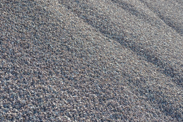 Breakstone background. Road gravel. Gravel texture. Crushed Gravel background. Piles of limestone rocks. Break stones on construction site.