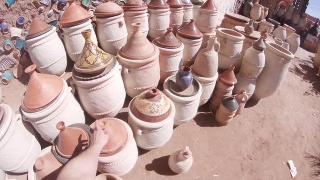POV, antique pottery in desert