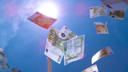 CLOSE UP: Making a fortune of money on stock markets. Money falling