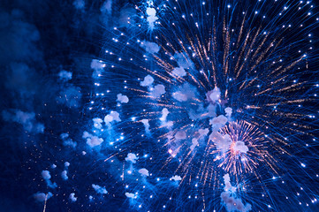 Very cheap firework over the city, red and blue