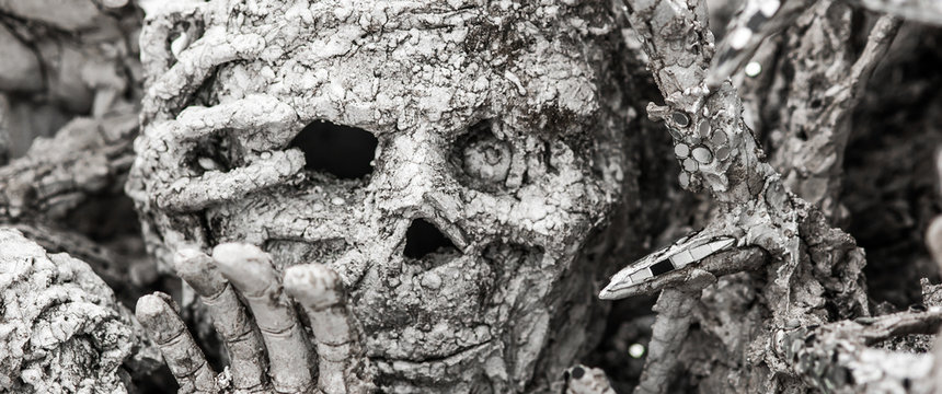 Closeup detail of metamorphic horror screaming face.  White Temple, Thailand