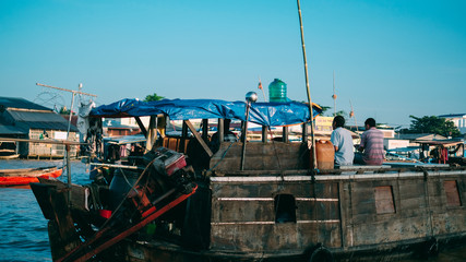 Unidentified people buy and sell on boat, ship in Cai Rang floating market at Mekong River. Royalty free stock image of the floating market or river market in Vietnam
