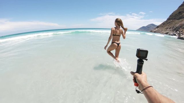 Recording woman in bikini in Cape Town, POV