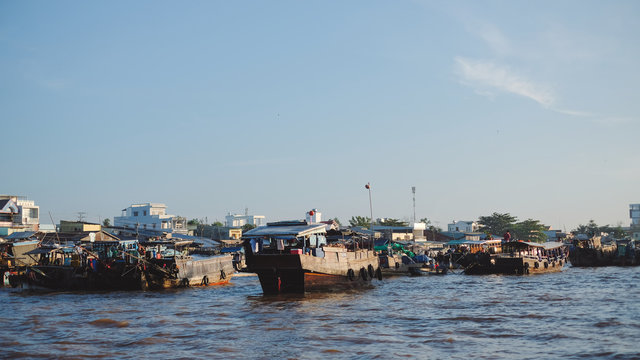 Unidentified people buy and sell on boat, ship in Cai Rang floating market at Mekong River. Royalty free stock image of the floating market or river market in Vietnam