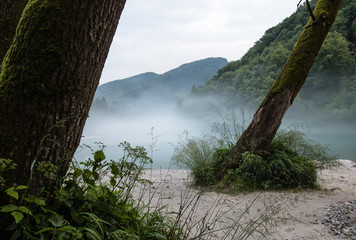 misty confluence of Soca and Tolminka river in Slovenia