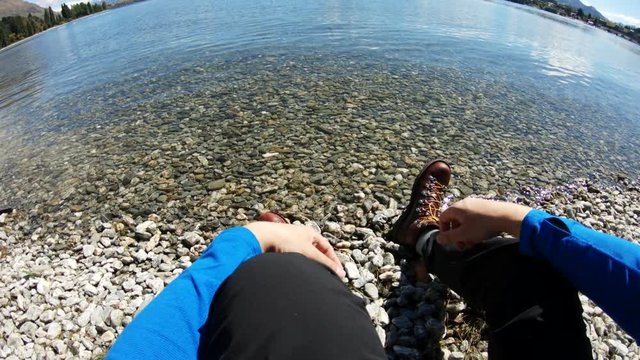 Sitting on edge of lake in New Zealand, POV
