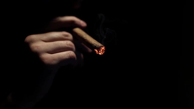Cigar smoke slow motion.