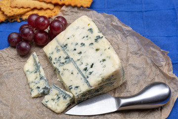 Blue cheese made from cow milk with Penicillinum mold, tasty soft cheese with specific odor