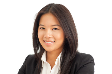 Close up of happy young Asian businesswoman smiling at camera