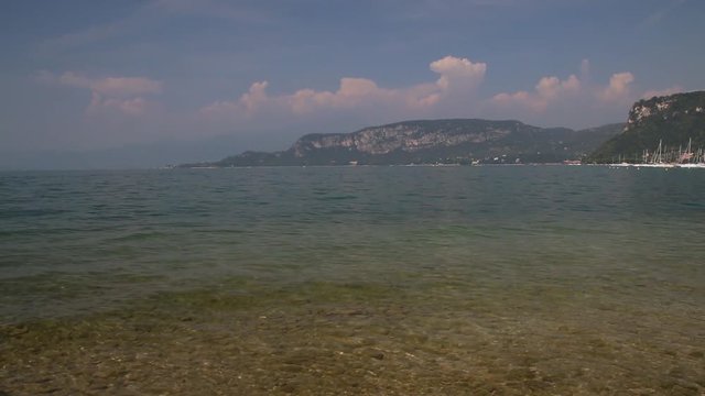 Panorama shot of Lake Garda (Lago Di Garda) with Corono in the back, taken from Bardolino, Italy.