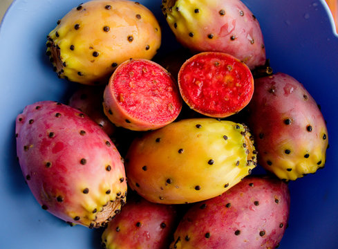 Prickly pear cactus colorful fresh ripe fruits in bowl. Opuntia fichi d'india