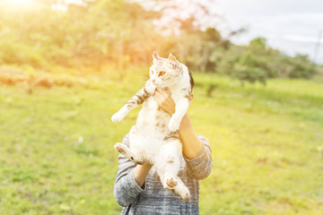 woman hold a cat