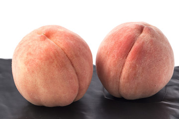 Ripe peach fruit isolated
