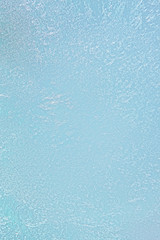 a glass plate frozen with water