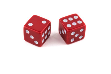 Two red dice closeup, isolated on white background, two and six