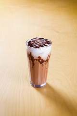 ice chocolate latte on a wooden table