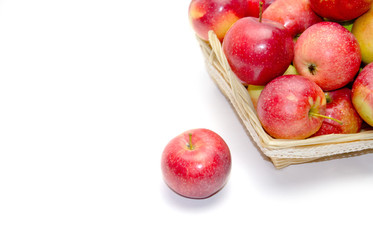 apples in basket on white background 