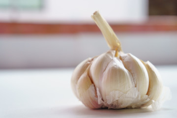 White garlic on old gray wood floor