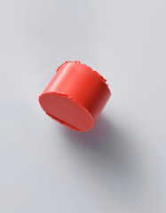 the texture of red lipstick a white background