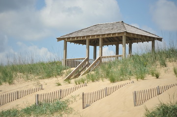 A beach gazebo in the sand dunes