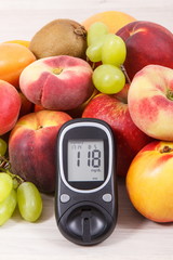 Glucose meter with result of measurement sugar level and healthy food as source vitamins, diabetes concept