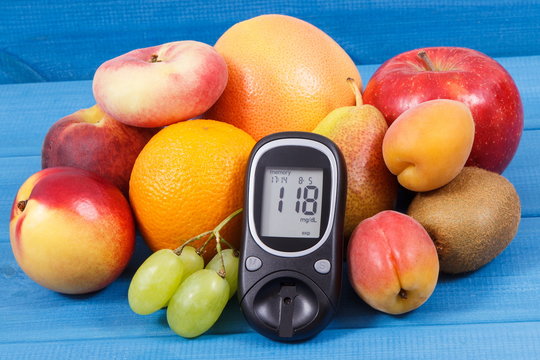 Glucometer for measuring sugar level and healthy food as source vitamins, diabetes concept