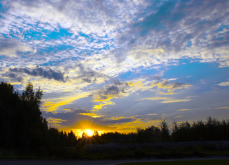 Naklejka na ściany i meble sunset sky setting sun beautiful clouds forest frame